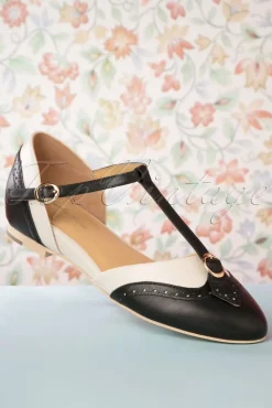 Shop Charlie Stone Parisienne T-Strap Flats In Zwart En Creme